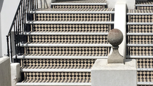 Chequerboard set tiles with marble treads, a common sight for properties on the south coast of England.