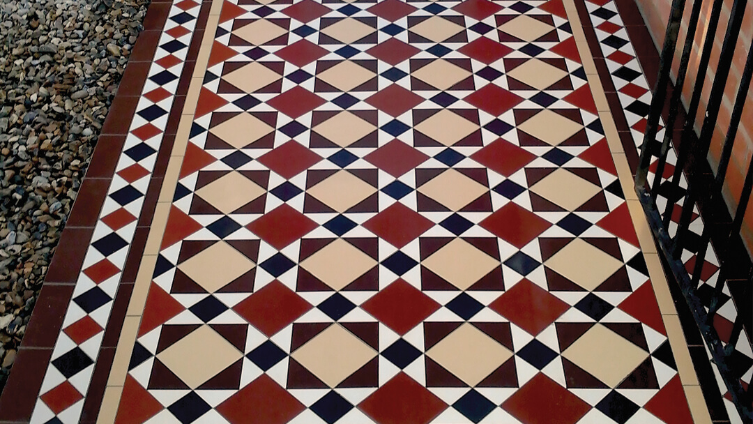 Colourful geometric Edwardian path tiles