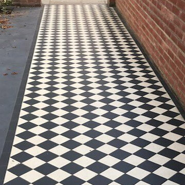 Edwardian black and white front entry path tiles. Black and white path tiles with diamond border