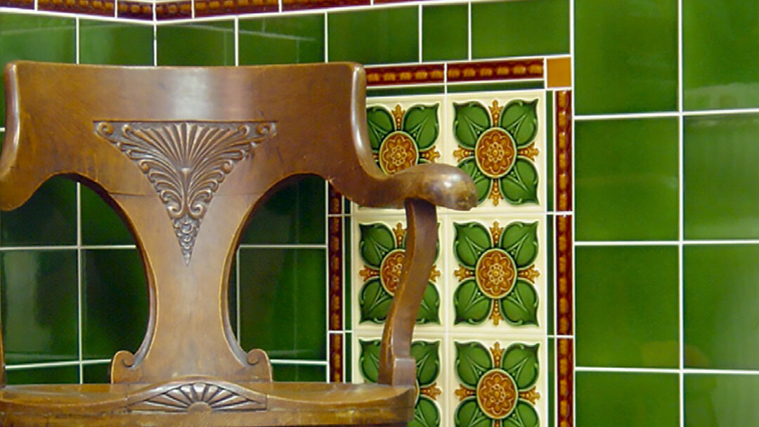 Victorian green hall wall tiles.