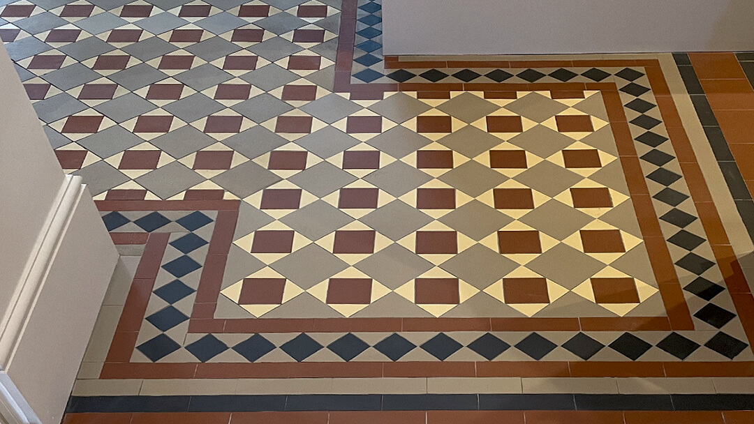 Restored and extended period floor tile design.